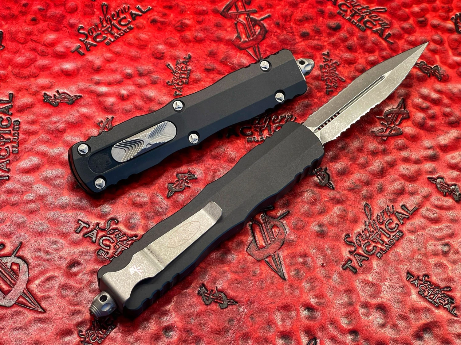Microtech Dirac Delta Double Edge Apocalyptic Part Serrated OTF Automatic Knife 2 Microtech Dirac Delta Double Edge Apocalyptic Part Serrated OTF Automatic Knife - Image 2