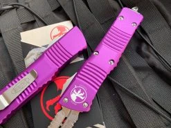Microtech Combat Troodon D/E Violet Aluminum W/ Stonewashed Partially Serrated Blade (3.75") 142-11VI 7 Microtech Combat Troodon D/E Violet Aluminum W/ Stonewashed Partially Serrated Blade (3.75") 142-11VI -PrecisionBladesMicrotech IMG 8634 08930.1682040491