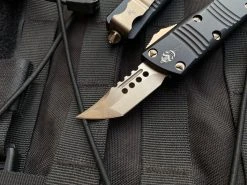Microtech Mini Troodon Hellhound Black Aluminum Body W/ Bronzed Plain Edge Blade (1.99") 819-13S -PrecisionBladesMicrotech IMG 8963 07008.1682548468