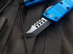 Microtech Mini Troodon Hellhound Blue Aluminum Body W/ Two Tone Black Plain Edge Blade (1.99") 819-1BLS 7 Microtech Mini Troodon Hellhound Blue Aluminum Body W/ Two Tone Black Plain Edge Blade (1.99") 819-1BLS -PrecisionBladesMicrotech IMG 8983 31553.1682548934