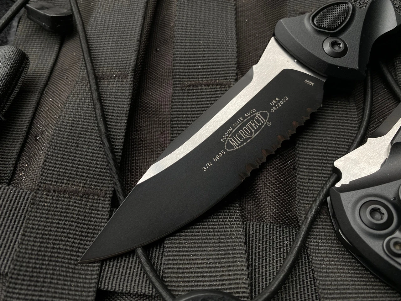 Microtech Socom Elite Auto S/E Black Aluminum Body W/ Two Tone Black Partially Serrated Blade (3.98”) 160A-2T 3 Microtech Socom Elite Auto S/E Black Aluminum Body W/ Two Tone Black Partially Serrated Blade (3.98”) 160A-2T - Image 3