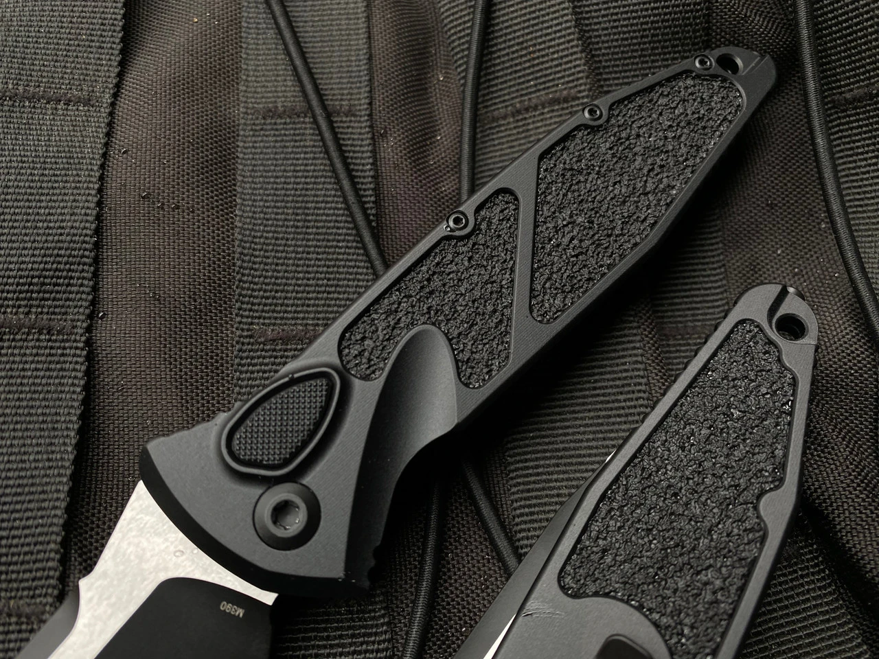 Microtech Socom Elite Auto S/E Black Aluminum Body W/ Two Tone Black Partially Serrated Blade (3.98”) 160A-2T 4 Microtech Socom Elite Auto S/E Black Aluminum Body W/ Two Tone Black Partially Serrated Blade (3.98”) 160A-2T - Image 4