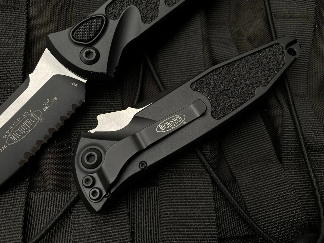 Microtech Socom Elite Auto S/E Black Aluminum Body W/ Two Tone Black Partially Serrated Blade (3.98”) 160A-2T 2 Microtech Socom Elite Auto S/E Black Aluminum Body W/ Two Tone Black Partially Serrated Blade (3.98”) 160A-2T - Image 2