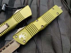Microtech Combat Troodon T/E OD Green Aluminum Body W/ Bronzed Apocalyptic Hardware And Plain Edge Blade (3.8") 144-13APOD 6 Microtech Combat Troodon T/E OD Green Aluminum Body W/ Bronzed Apocalyptic Hardware And Plain Edge Blade (3.8") 144-13APOD -PrecisionBladesMicrotech IMG 9122 42733.1682973710