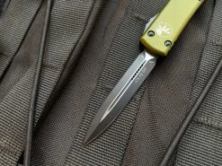 Microtech UTX-70 D/E OD Green Aluminum Body W/ Black Plain Edge Blade (2.42") 147-1OD 7 Microtech UTX-70 D/E OD Green Aluminum Body W/ Black Plain Edge Blade (2.42") 147-1OD -PrecisionBladesMicrotech IMG 9836 49638.1684870368
