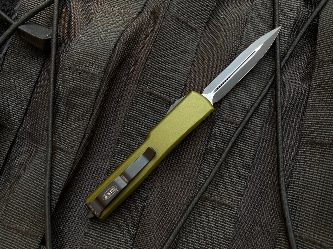 Microtech UTX-70 D/E OD Green Aluminum Body W/ Black Plain Edge Blade (2.42") 147-1OD 3 Microtech UTX-70 D/E OD Green Aluminum Body W/ Black Plain Edge Blade (2.42") 147-1OD - Image 3