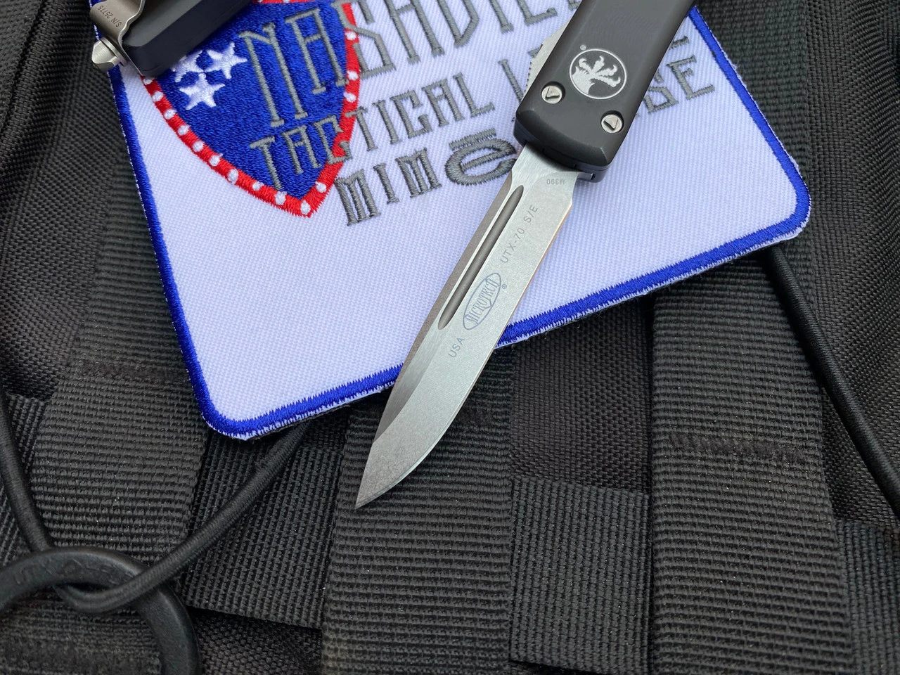 Microtech UTX-70 S/E Black Aluminum Body W/ Stonewashed Plain Edge Blade (2.42") 148-10 3 Microtech UTX-70 S/E Black Aluminum Body W/ Stonewashed Plain Edge Blade (2.42") 148-10 - Image 3