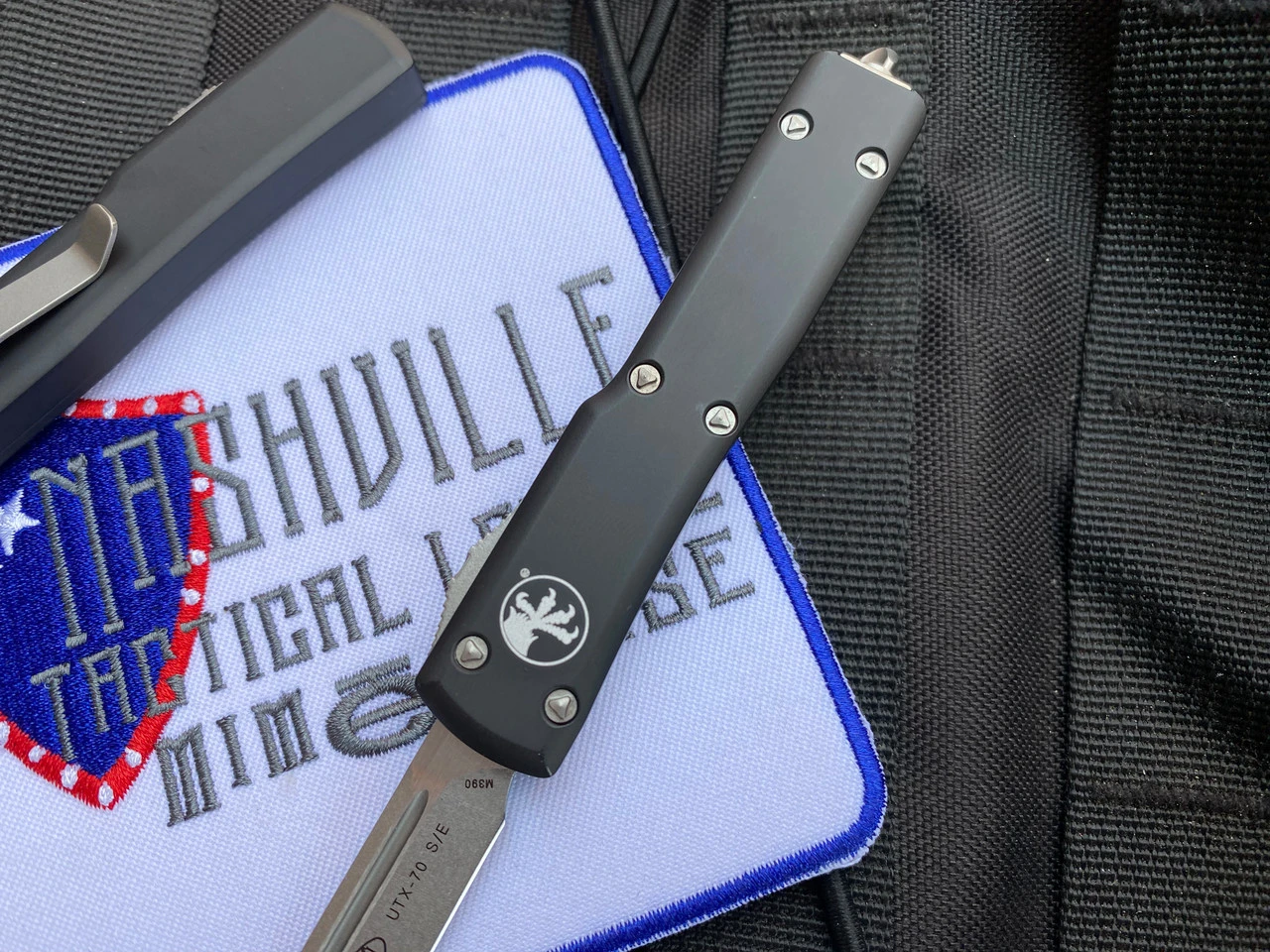 Microtech UTX-70 S/E Black Aluminum Body W/ Stonewashed Plain Edge Blade (2.42") 148-10 2 Microtech UTX-70 S/E Black Aluminum Body W/ Stonewashed Plain Edge Blade (2.42") 148-10 - Image 2