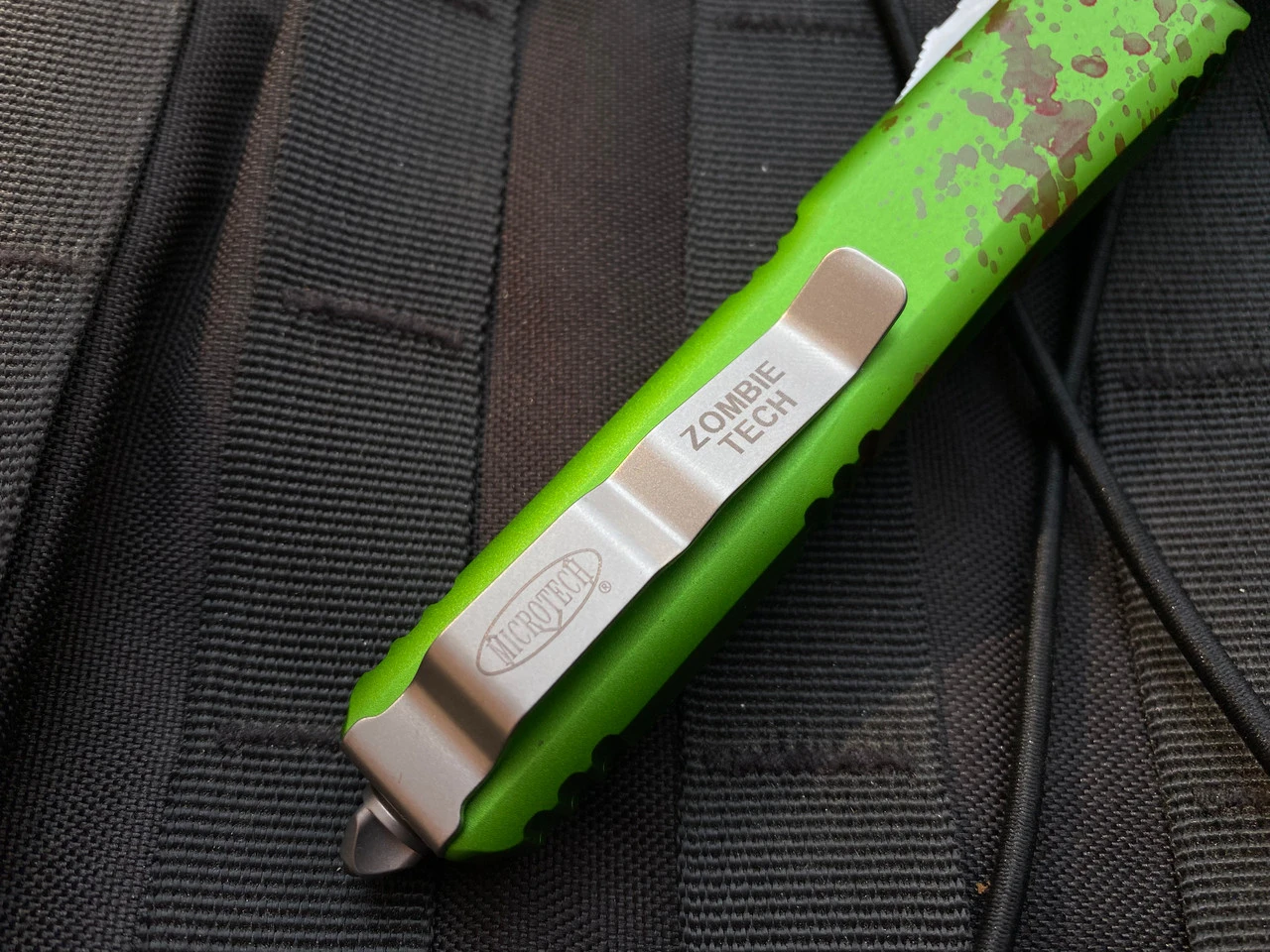 Microtech Zombietech D/E Green Aluminum Blood Splatter Body W/ Stonewashed Plain Edge Blade (3.4") 122-10Z 2 Microtech Zombietech D/E Green Aluminum Blood Splatter Body W/ Stonewashed Plain Edge Blade (3.4") 122-10Z - Image 2