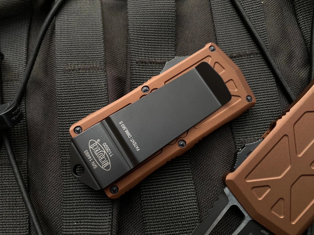 Microtech Exocet T/E Tan Aluminum Body W/ Black Plain Edge Blade (1.9") 158-1TA 2 Microtech Exocet T/E Tan Aluminum Body W/ Black Plain Edge Blade (1.9") 158-1TA - Image 2