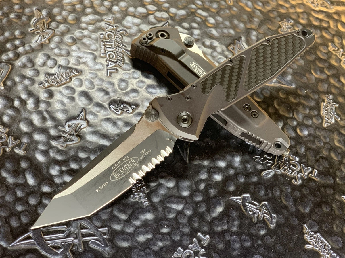 Microtech Socom Elite Manual Tanto Part Serrated Black Carbon Fiber Inlay 1 Microtech Socom Elite Manual Tanto Part Serrated Black Carbon Fiber Inlay