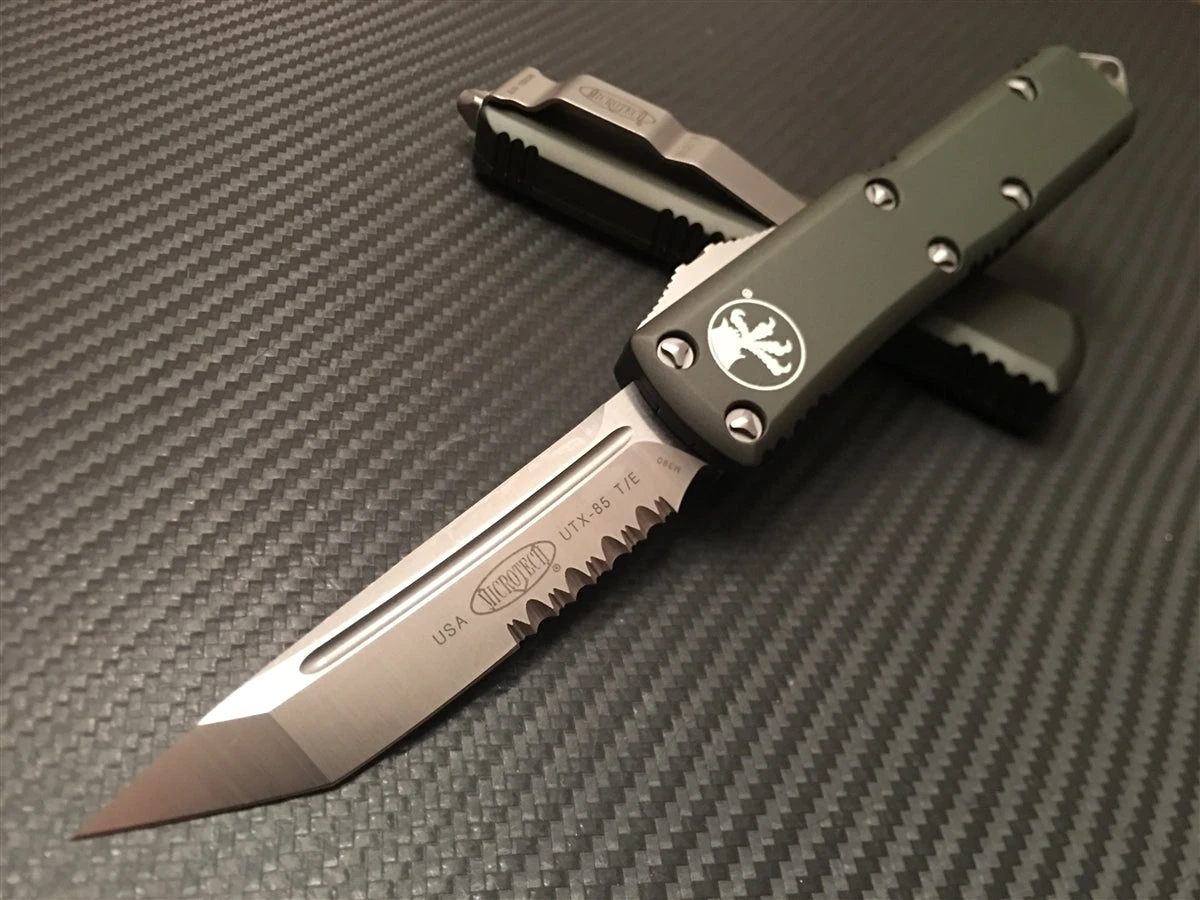 Microtech UTX85 Tanto Satin Part Serrated OD Green 1 Microtech UTX85 Tanto Satin Part Serrated OD Green