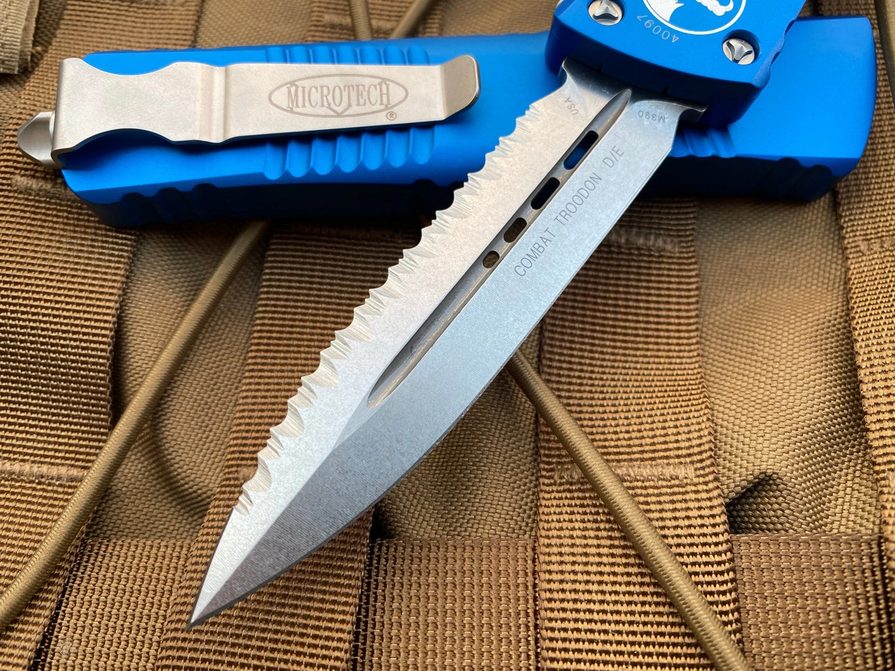Microtech Combat Troodon D/E Blue Aluminum Body W/ Stonewashed Full Serrated Blade (3.81”) 142-12BL 3 Microtech Combat Troodon D/E Blue Aluminum Body W/ Stonewashed Full Serrated Blade (3.81”) 142-12BL - Image 3