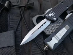 Microtech Troodon D/E Black Aluminum Body W/ Satin Plain Edge Blade (3”) 138-4 5 Microtech Troodon D/E Black Aluminum Body W/ Satin Plain Edge Blade (3”) 138-4 -PrecisionBladesMicrotech image 1fce146a 4b12 4b3b 8114 d581a5b7232d 13829.1680805517