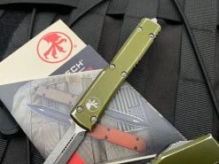 Microtech UTX-70 Spartan OD Green Distressed Aluminum Body W/ Apocalyptic Plain Edge Blade (2.42”) 249-10DOD -PrecisionBladesMicrotech image 2746b1ce 4d24 4da0 a678 e7a94bf141d0 02955.1680805529