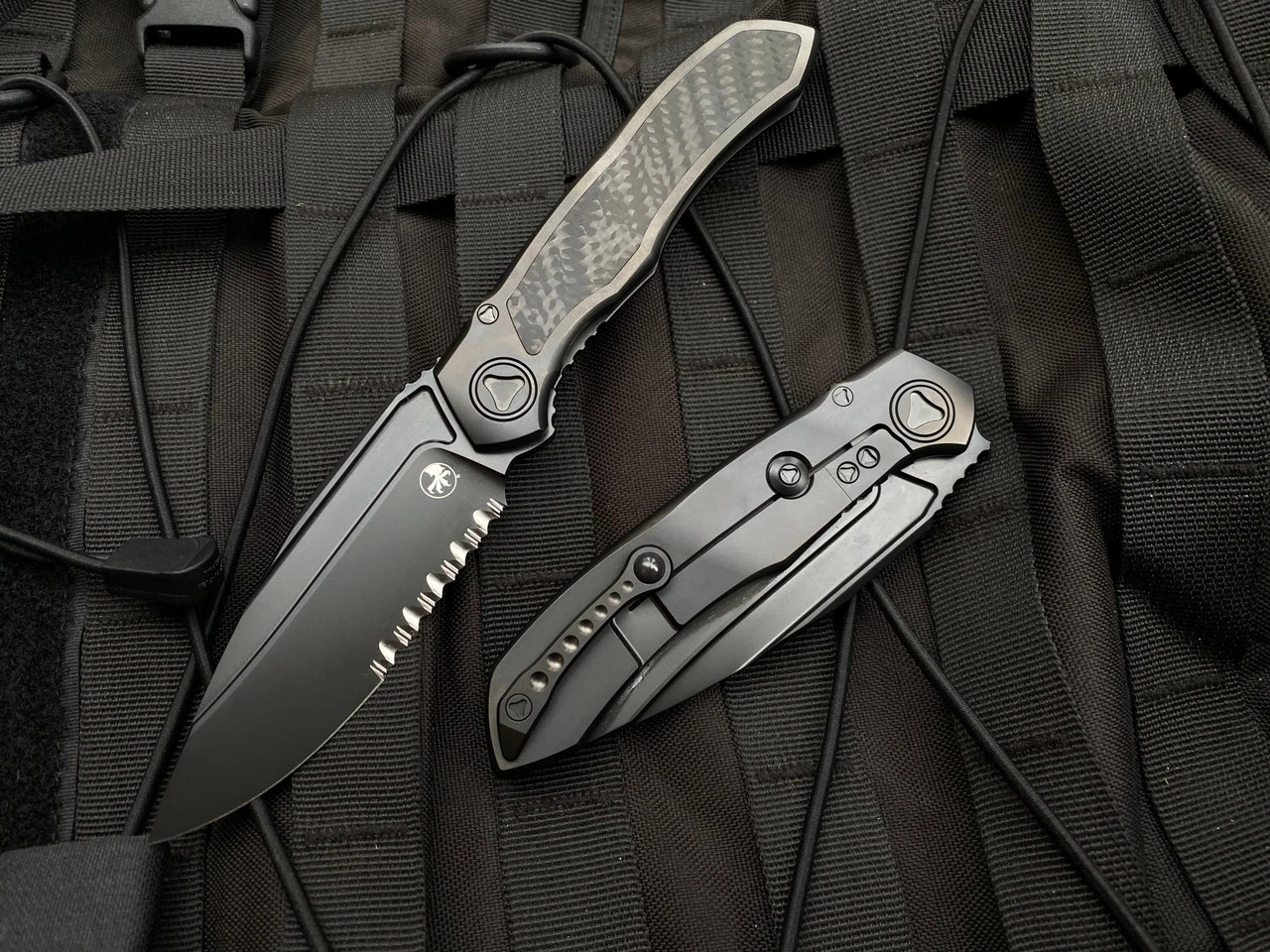Microtech Anax S/E Integral Folder Full DLC Titanium Carbon Fiber Inlaid Body W/ DLC Partially Serrated Blade (3.69”) 190C-2DLCTCFITI 1 Microtech Anax S/E Integral Folder Full DLC Titanium Carbon Fiber Inlaid Body W/ DLC Partially Serrated Blade (3.69”) 190C-2DLCTCFITI