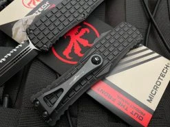 Microtech Hera Frag Pattern Black Aluminum Body W/ Black Tactical Full Serrated Blade (3.08”) 702-3TFRS -PrecisionBladesMicrotech image 53df14f3 6f7b 4f75 8136 42405aed44e1 19637.1680805537