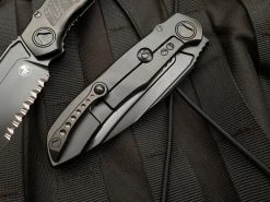 Microtech Anax S/E Integral Folder Full DLC Titanium Carbon Fiber Inlaid Body W/ DLC Partially Serrated Blade (3.69”) 190C-2DLCTCFITI 7 Microtech Anax S/E Integral Folder Full DLC Titanium Carbon Fiber Inlaid Body W/ DLC Partially Serrated Blade (3.69”) 190C-2DLCTCFITI -PrecisionBladesMicrotech image 75fbd08c 5e03 4f9e 93b9 ccb70d6c7e34 56480.1680805539