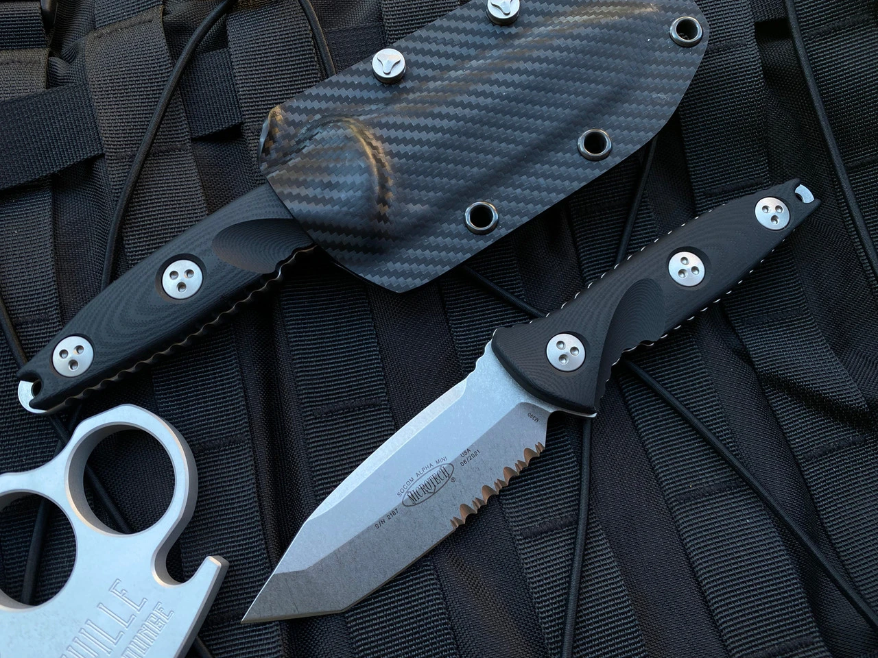 Microtech Socom Alpha Mini T/E Black G10 Scales W/ Stonewashed Tanto Partially Serrated Blade (3.72”) 114M-11 1 Microtech Socom Alpha Mini T/E Black G10 Scales W/ Stonewashed Tanto Partially Serrated Blade (3.72”) 114M-11