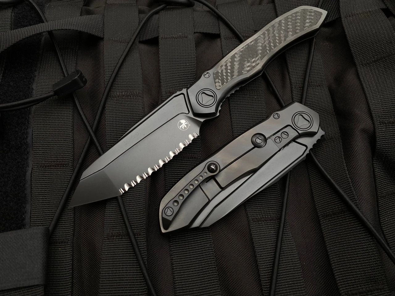 Microtech Anax T/E Integral Folder Full DLC Titanium Carbon Fiber Inlaid Body W/ DLC Full Serrated Blade (3.69”) 191C-3DLCTCFITI 1 Microtech Anax T/E Integral Folder Full DLC Titanium Carbon Fiber Inlaid Body W/ DLC Full Serrated Blade (3.69”) 191C-3DLCTCFITI