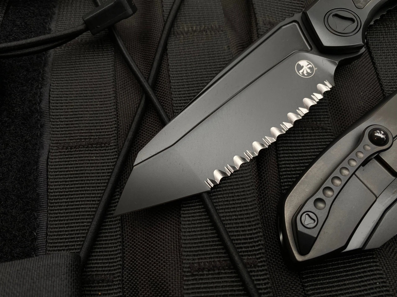 Microtech Anax T/E Integral Folder Full DLC Titanium Carbon Fiber Inlaid Body W/ DLC Full Serrated Blade (3.69”) 191C-3DLCTCFITI 2 Microtech Anax T/E Integral Folder Full DLC Titanium Carbon Fiber Inlaid Body W/ DLC Full Serrated Blade (3.69”) 191C-3DLCTCFITI - Image 2