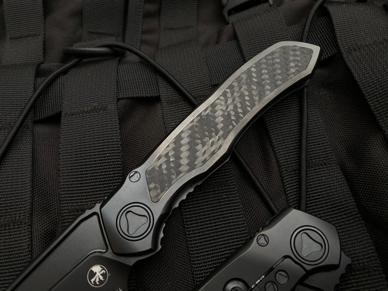 Microtech Anax T/E Integral Folder Full DLC Titanium Carbon Fiber Inlaid Body W/ DLC Full Serrated Blade (3.69”) 191C-3DLCTCFITI 3 Microtech Anax T/E Integral Folder Full DLC Titanium Carbon Fiber Inlaid Body W/ DLC Full Serrated Blade (3.69”) 191C-3DLCTCFITI - Image 3