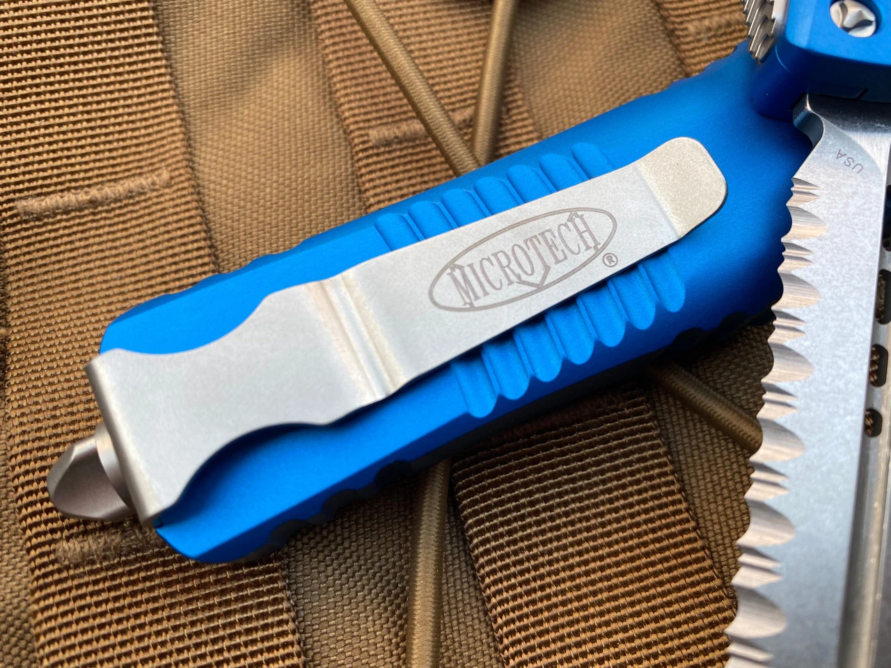 Microtech Combat Troodon D/E Blue Aluminum Body W/ Stonewashed Full Serrated Blade (3.81”) 142-12BL 2 Microtech Combat Troodon D/E Blue Aluminum Body W/ Stonewashed Full Serrated Blade (3.81”) 142-12BL - Image 2